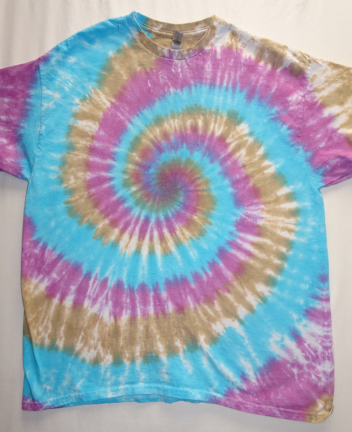 Aqua/tan/mauve spiral